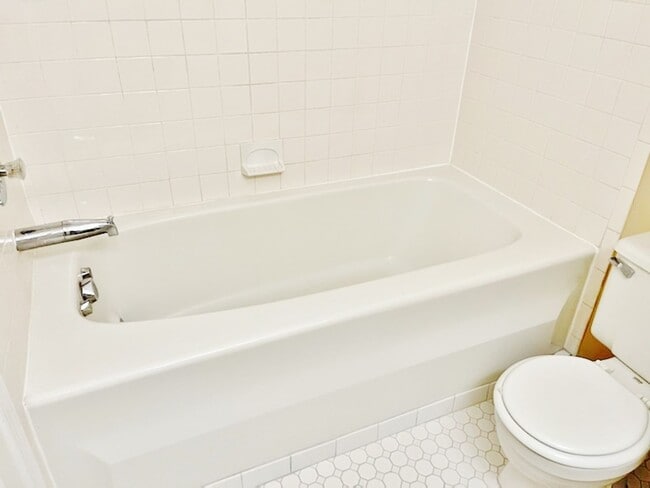 Building Photo - Updated, all brick 3 level townhouse pet friendly townhouse for rent!