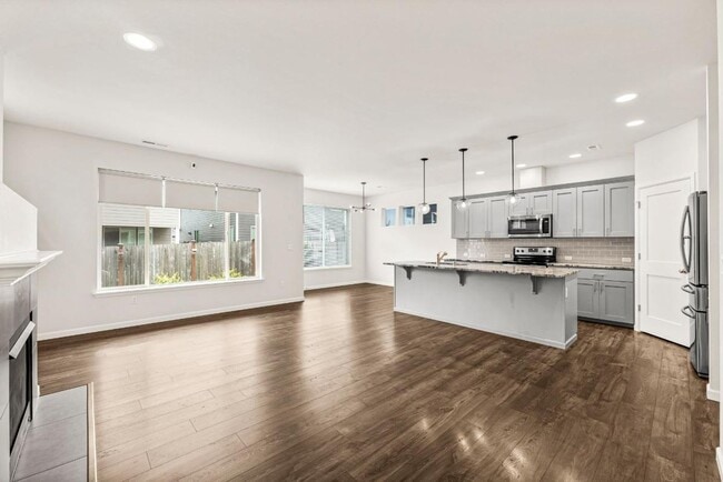 Building Photo - Spacious 4-Bedroom Home with Quartz Counters, Fully Fenced Yard & 2-Car Garage in Yelm!