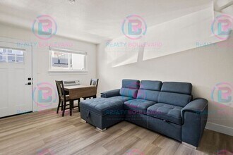 Building Photo - Studio apartment available now in the hear...