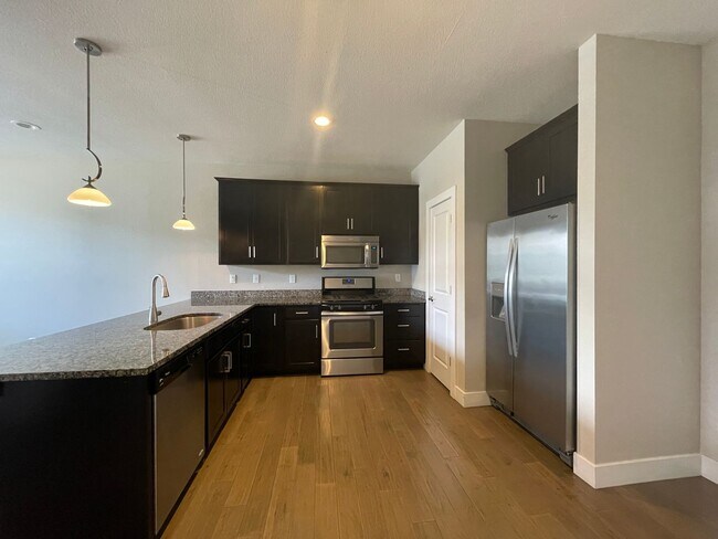 Building Photo - Spacious 3 level, 4 bedroom townhome with attached 2 car garage at Silver Meadows Townhomes on Lo...