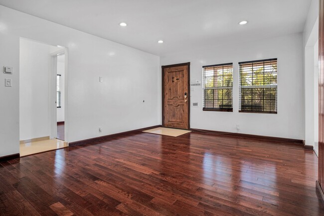Building Photo - Stunning Remodeled Corner-Lot Home – An En...