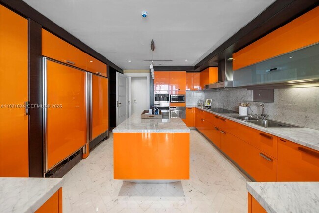 Building Photo - 7471 Fisher Island Dr