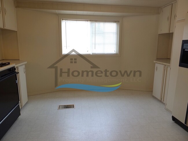 Building Photo - Spacious 2 Bedroom Home with Wood Stove in...