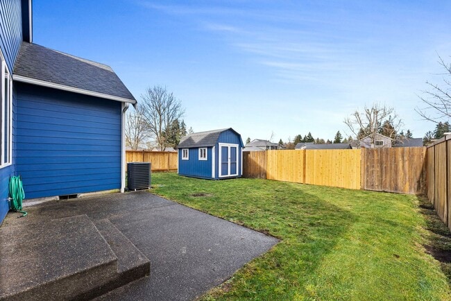 Building Photo - Vaulted Ceilings, A/C & Fully Fenced Yard – Beautiful 3-Bedroom Olympia Home!