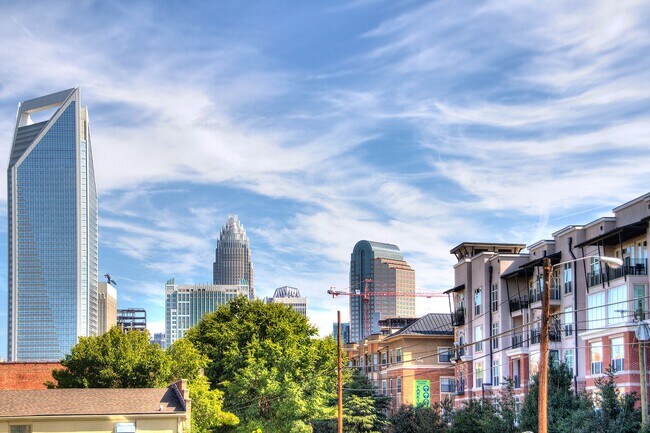 Building Photo - Experience urban living in this stylish to...