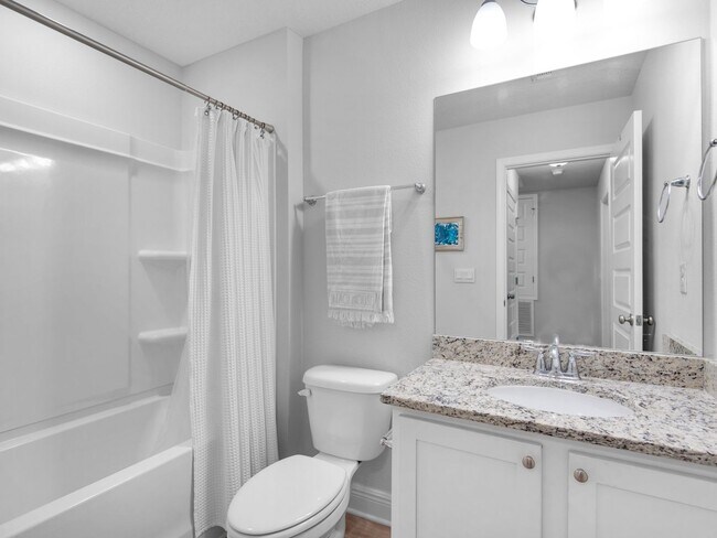 Building Photo - Brand New Furnished Townhome located just ...