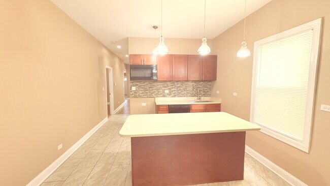 Building Photo - 9738 S Ave L