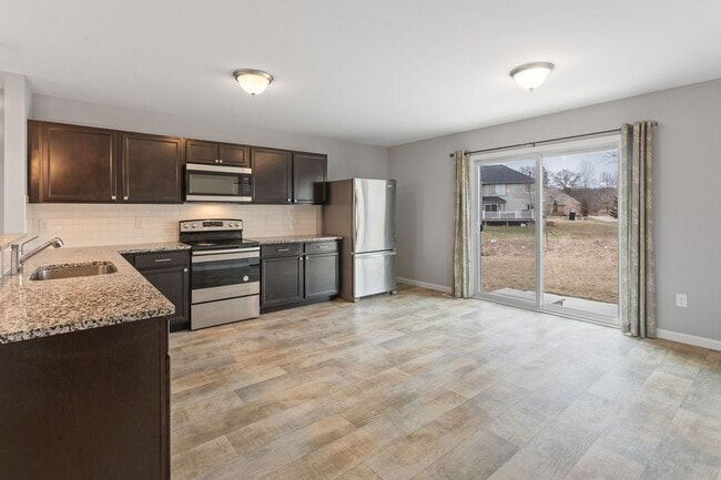 Building Photo - COMING SOON! Spacious 4-Bed Grand Blanc Home with Modern Comfort