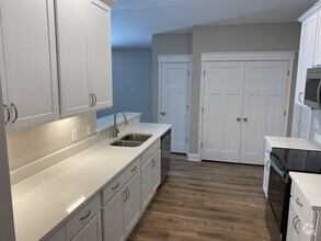 Building Photo - 9238 E River Dr