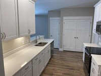 Building Photo - 9238 E River Dr