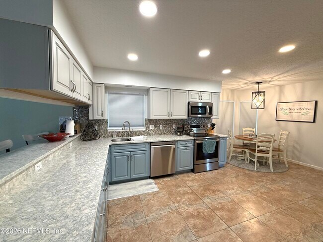 Building Photo - 8997 Adams Walk Dr