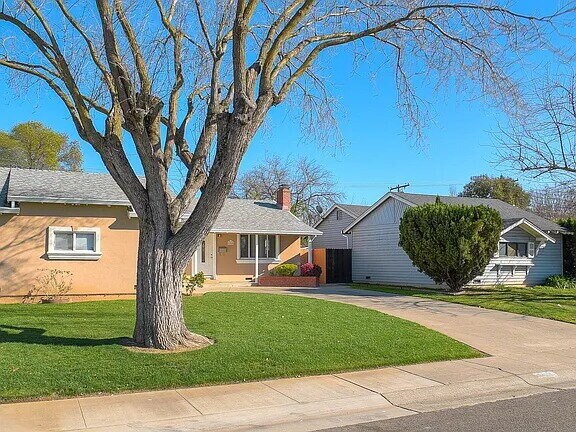 Building Photo - An attractive 3 bedroom, 2 bath, 1352 square foot home is now available for rent