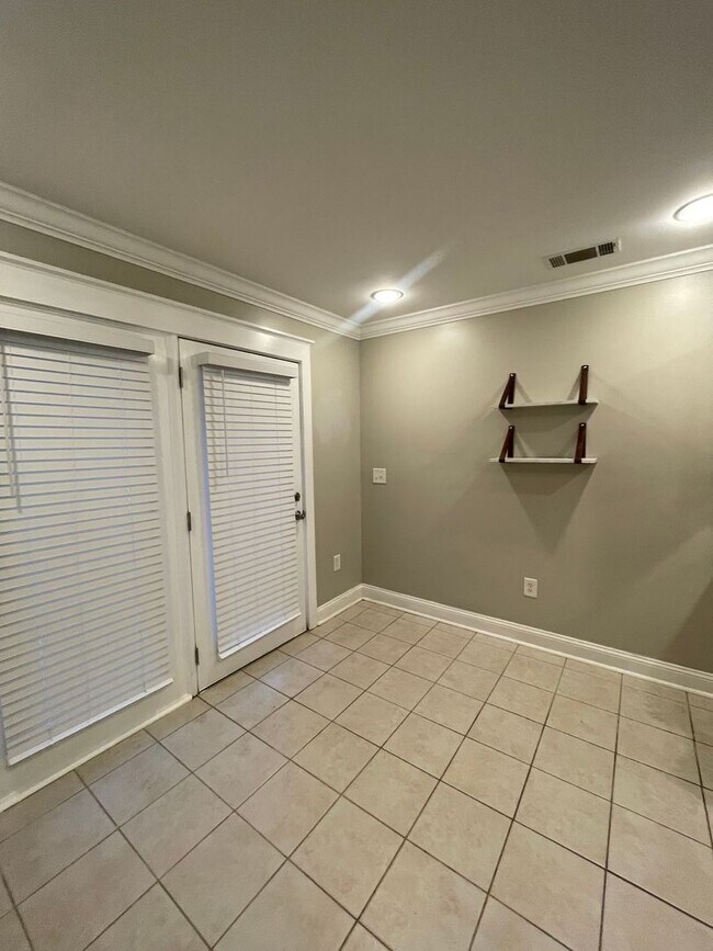 Building Photo - Two Bedrooms Available in this Three Bedroom Flat, Female Applicants!