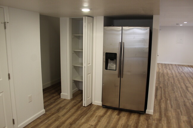 Kitchen Pantry - large stainless refrigerator - 2712 S Cole Ct