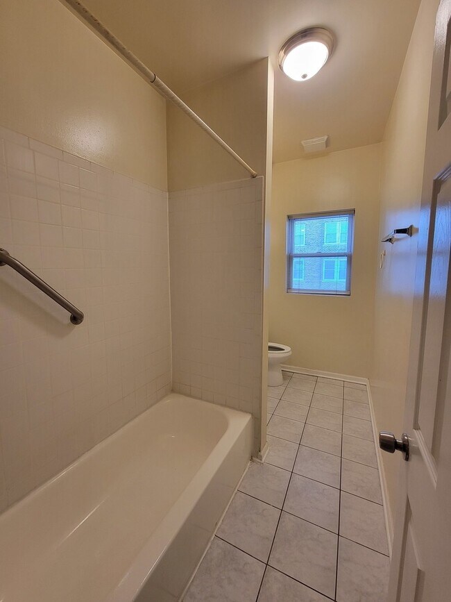 Building Photo - 7141 S Euclid Ave