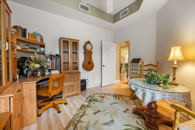 Building Photo - Experience Bell Tower Park. GATED ground floor 2 Bed 2 Bath Den 1 Car Garage Condo.