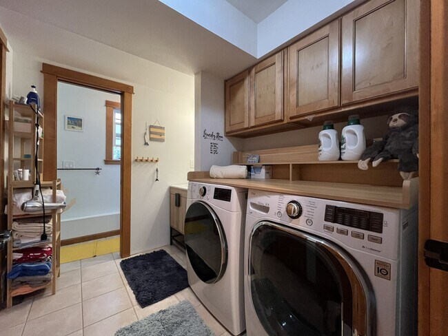 Building Photo - Bright and Open 4 Bedroom Cedar Mill Home with Vaulted Ceilings, Skylights & Multiple Living Areas