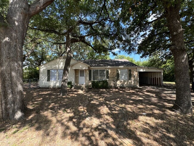 Building Photo - Denton Charmer with Big Yard, Carport & Flexible Living Space