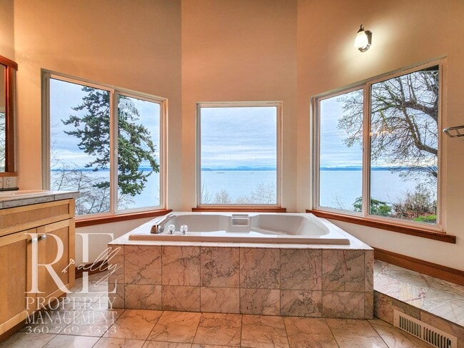 Building Photo - MOVE-IN SPECIAL: 50% OFF FIRST MONTHS RENT - Waterfront Rustic Retreat with Vaulted Ceilings, Pic...