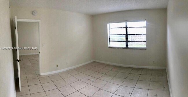 Building Photo - 11213 Royal Palm Blvd