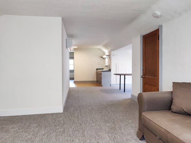 Looking from living room past dining area towards kitchen - 138 Cypress Ave. E