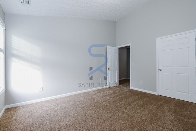 Building Photo - Move in before February 15th and choose your reward: a $250 Amazon Gift Card or a 55" Smart TV!