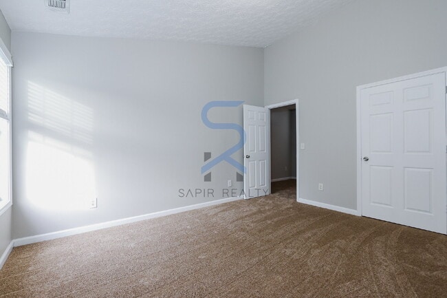 Building Photo - Move in before January 31st and choose your reward: a $250 Amazon Gift Card or a 55" Smart TV!