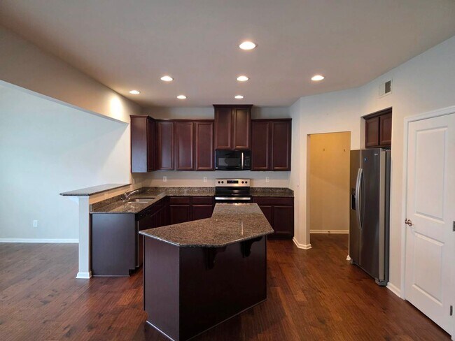 Building Photo - Charming 4 Bed • 2½ Bath Home in The Farm ...