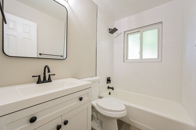 Building Photo - "Charming 4-Bedroom Home with 2 Full Baths...