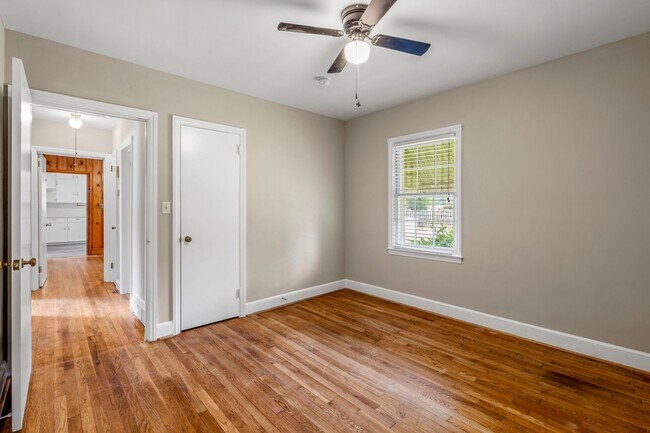 Building Photo - Large Renovated Ranch Home, Two Kitchens & Two Living Areas, Hardwood Flooring, Deck, Fenced!