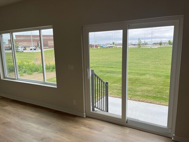 Building Photo - Spacious 5-Bedroom Duplex Near Asbury Elementary with Finished Basement & Full Amenities
