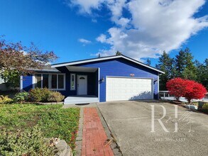 Building Photo - Rambler with 2-Car Garage, RV/Boat Parking...