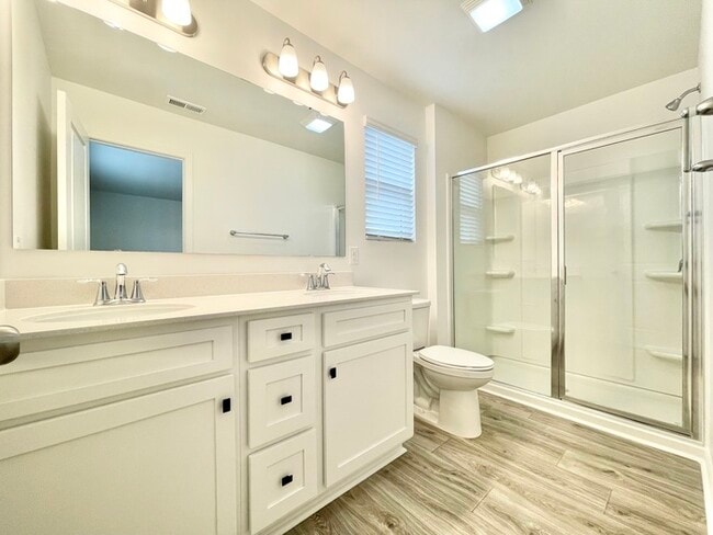 Building Photo - Three bedroom 2 1/2 bath paired home. Clos...