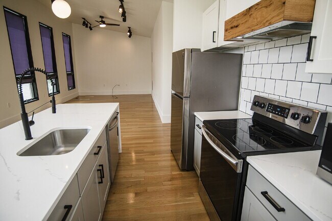 Building Photo - August Only: Submit your application this month and pay a reduced application fee of just $32. Ch...