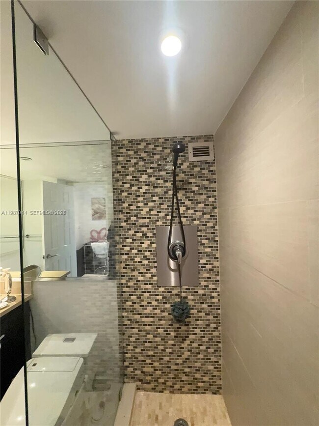 Building Photo - 5555 Collins Ave