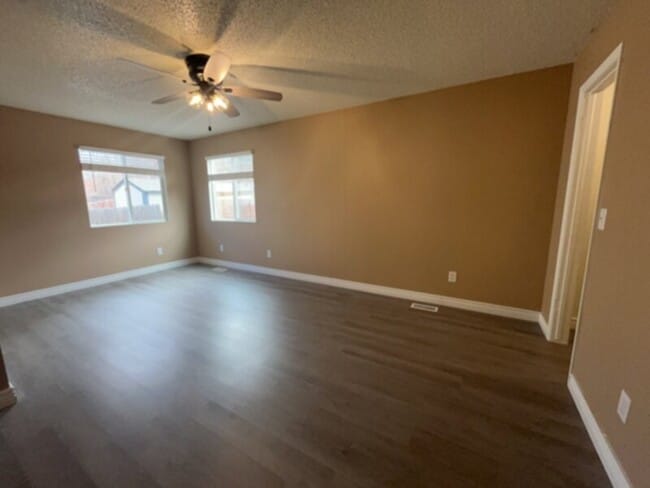 Building Photo - Beautiful ranch style home that has a finished basement and stunning views from the front deck!