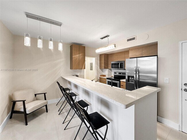Building Photo - 10185 Collins Ave