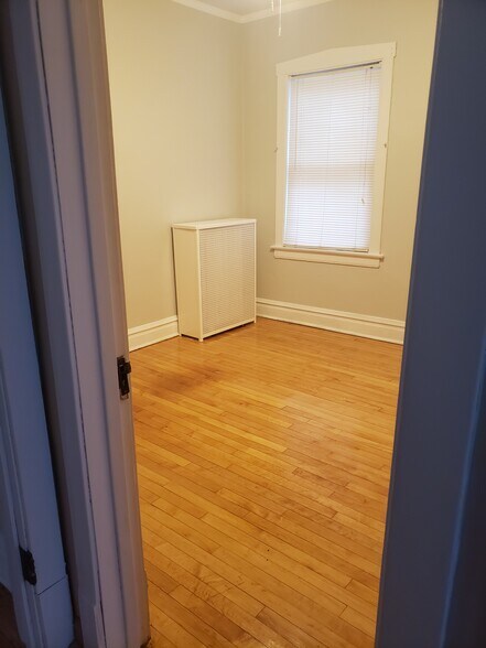 2nd bedroom with hardwood floors - 3811 N Central Park Ave