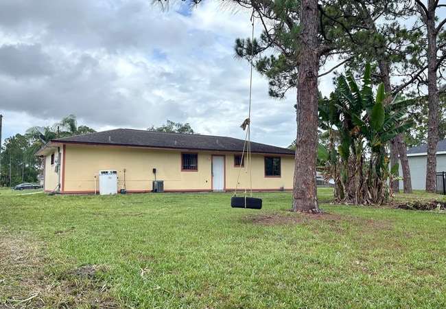 Building Photo - 322 Ixora Ave NW