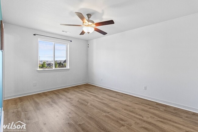 Building Photo - Welcome Home: Big Yard, Garage, and Pets A...