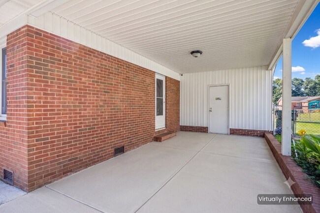 Building Photo - Charming All-Brick 3BR Home with Carport & Easy Charlotte Commute!