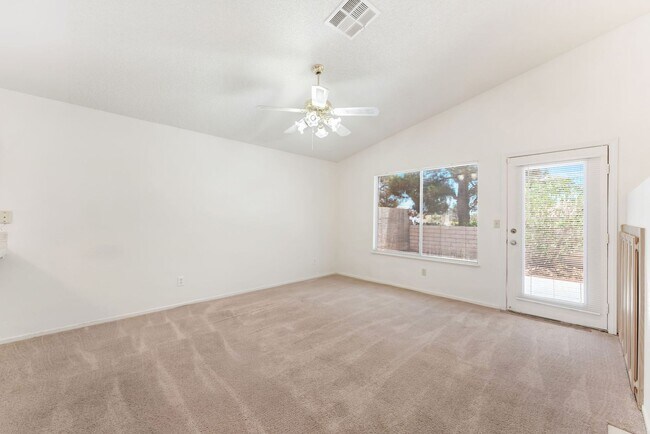 Building Photo - Vaulted Ceilings, Cozy Fireplace & Desirable Single-Story Living Near The Lakes!