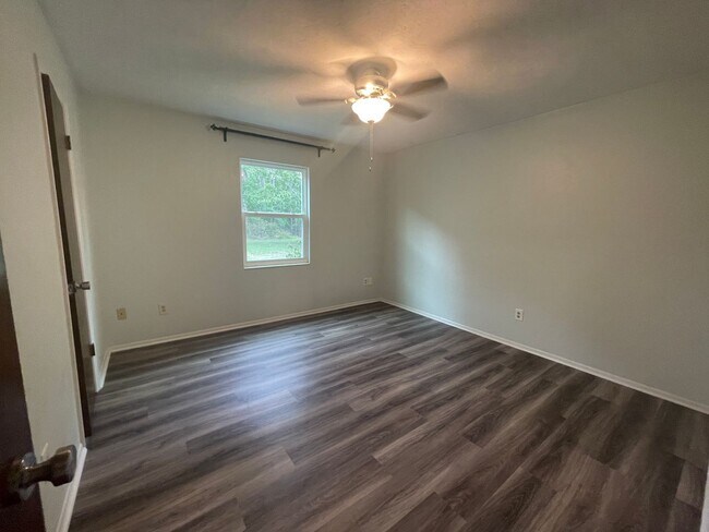 Building Photo - 3/2 (Northwood Oaks) Beautiful split floor plan home with custom brick accents and large landscap...