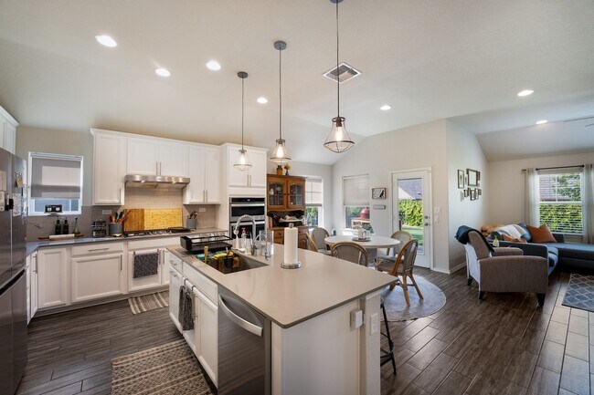 Building Photo - 4 Bedroom Home with Stone Patio, Built-In Gazebo & Amenity-Rich Community Living