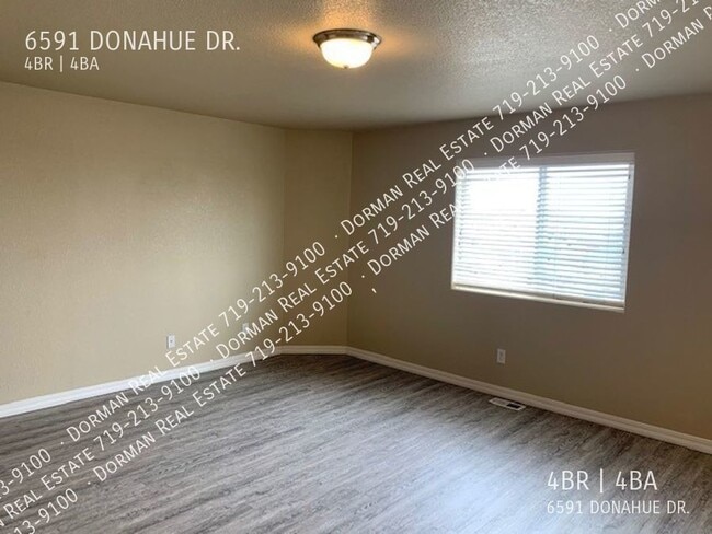 Building Photo - 6591 Donahue Drive
