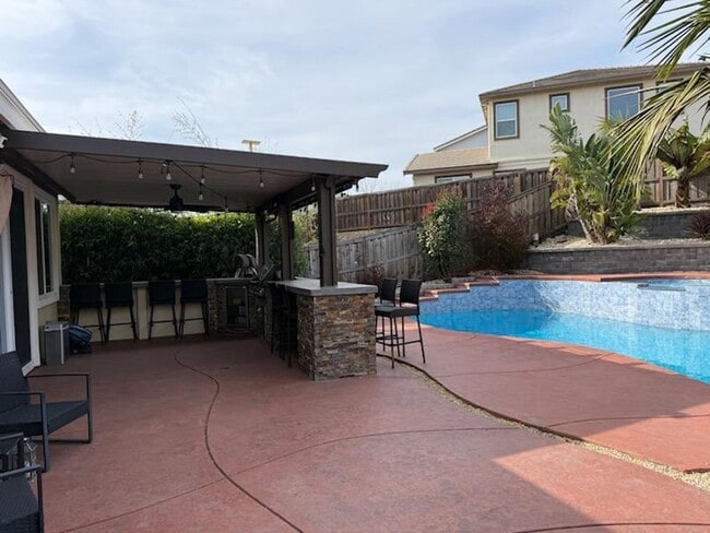 Building Photo - Spacious Single-Story Home with Pool, Solar & Outdoor Kitchen