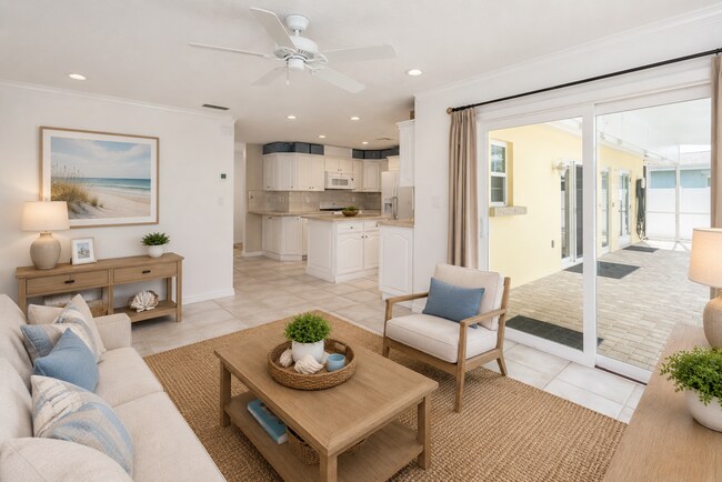 Building Photo - Live the ultimate Space Coast waterfront lifestyle at this stunning beachside canal home in Satel...
