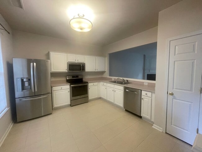 Building Photo - 6876 Rothchild Dr