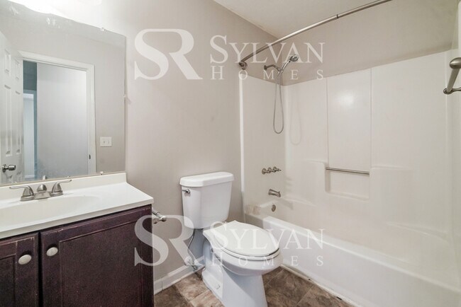 Building Photo - Immerse yourself in comfort and convenience