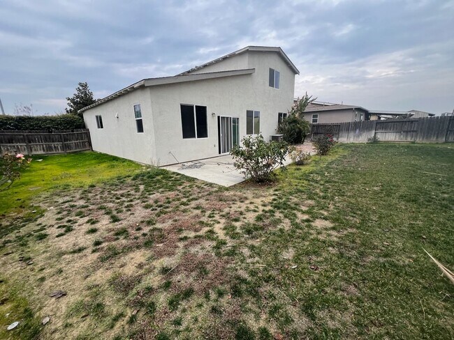 Building Photo - 4 Bedroom Home Coming Soon in DINUBA!